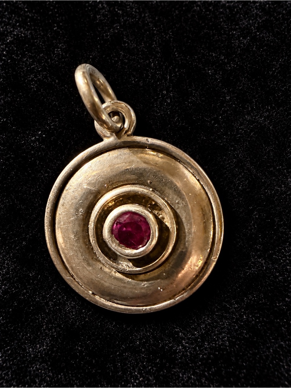 Sterling Silver Circular Pendant Necklace with Red Center Stone